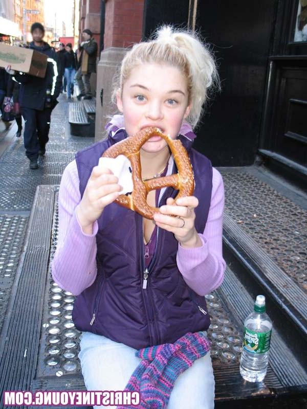 15P Fun-loving teen Christine Young posing and teasing outdoors