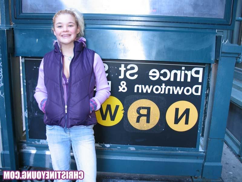15P Fun-loving teen Christine Young posing and teasing outdoors