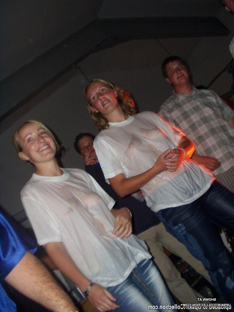 15P Their cloths are wet and sheer exposing nips