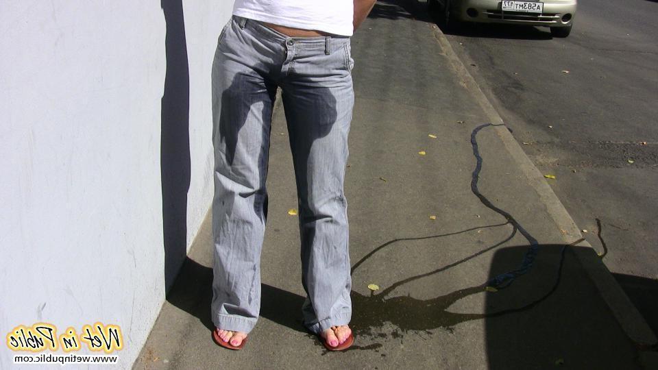 15P Wet outdoor gray jeans of a bunny who needed to do a pee and did it