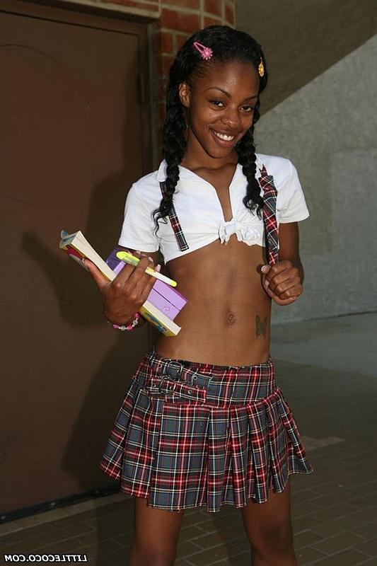 16P Petite ebony coed with pigtails spreading her pussy