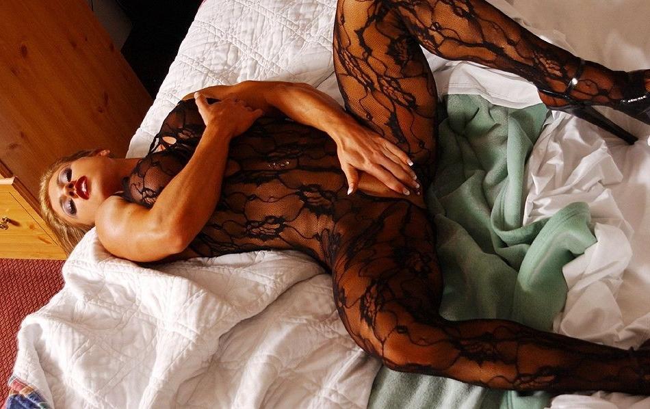 15P Muscle blonde teen with big tits teases in sexy bodystockings