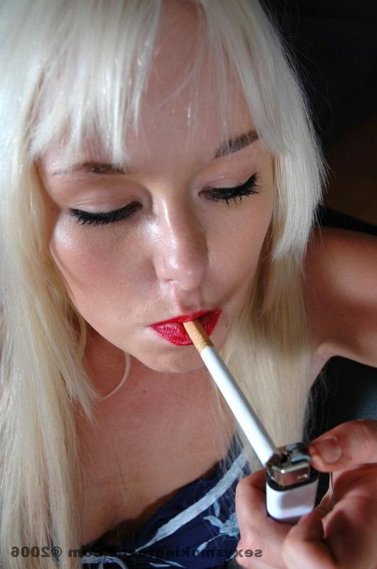 15P Topless blonde teen slut smokes a cigarette