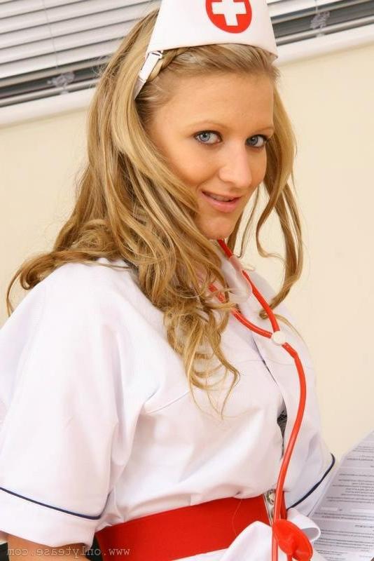 16P Sexy Nurse Stripping To Stockings