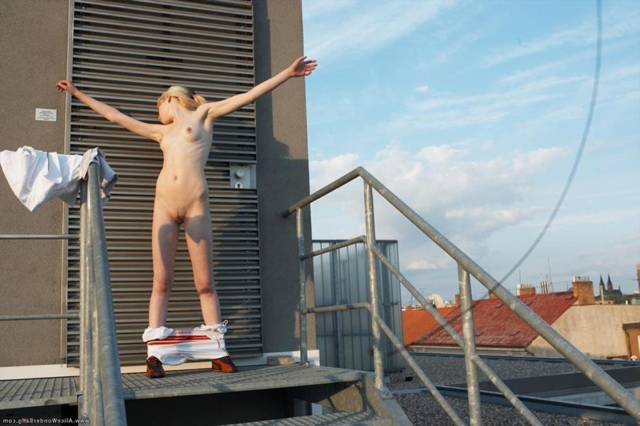 17P Beautiful skinny Alice pulling down all her garments on camera
