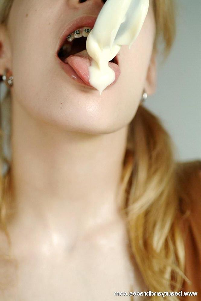 16P Pigtailed blonde teen with sexy braces gets messy with pudding