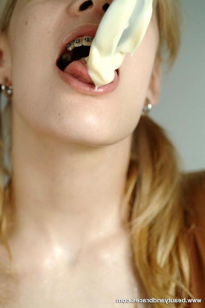 16P Pigtailed blonde teen with sexy braces gets messy with pudding