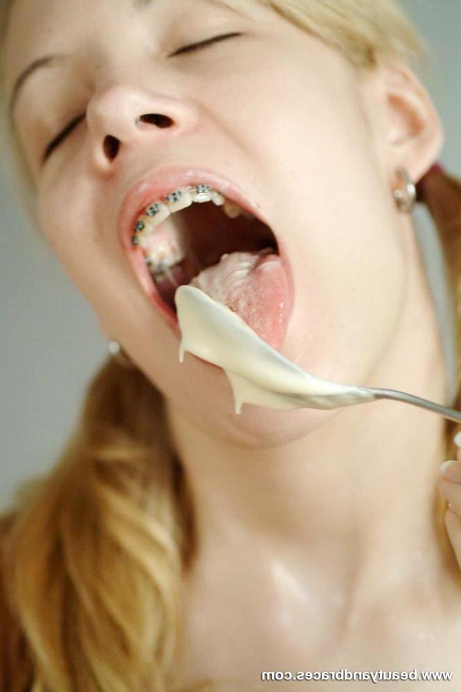 16P Pigtailed blonde teen with sexy braces gets messy with pudding