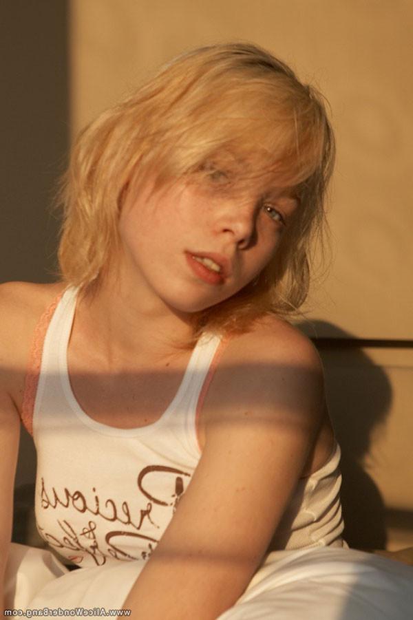 17P Cute small titted blonde teenie pulling down her orange panties
