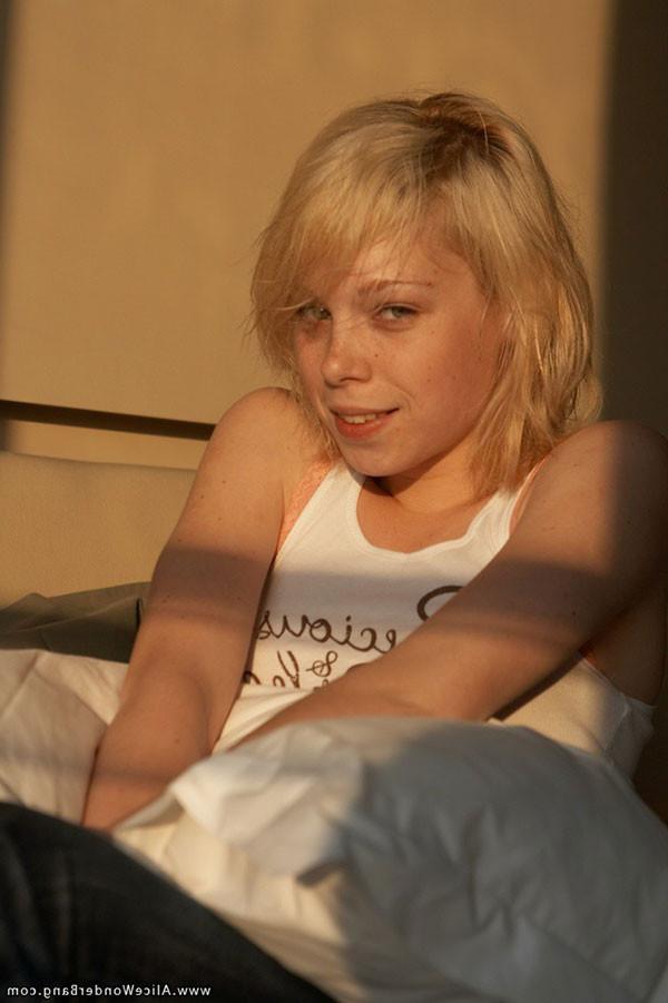17P Cute small titted blonde teenie pulling down her orange panties