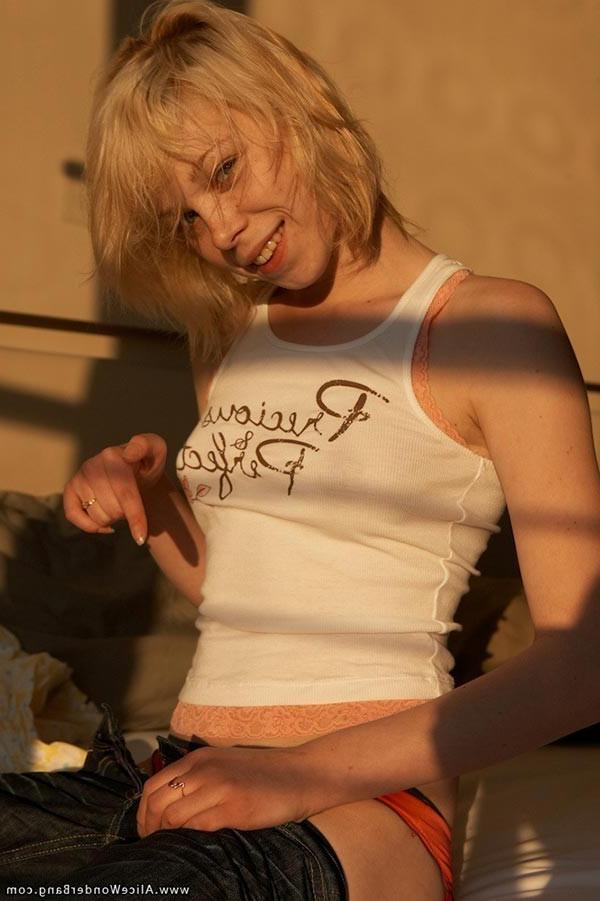 17P Cute small titted blonde teenie pulling down her orange panties
