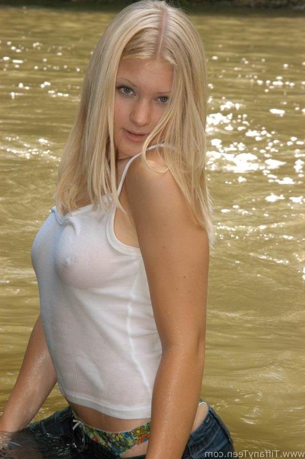 16P Cute blonde teen posing in wet t-shirt outside