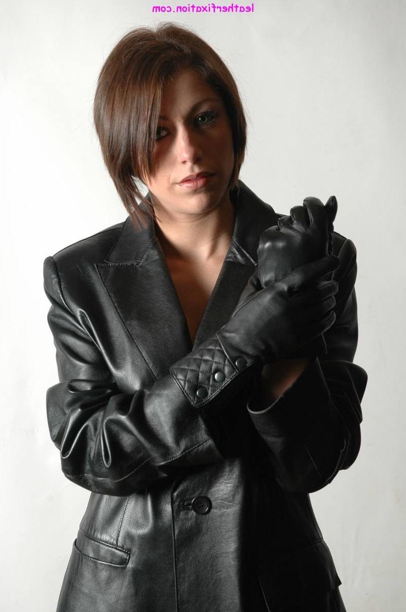 15P Gorgeous brunette in sexy black leather jacket accompanied by a pair of soft lea
