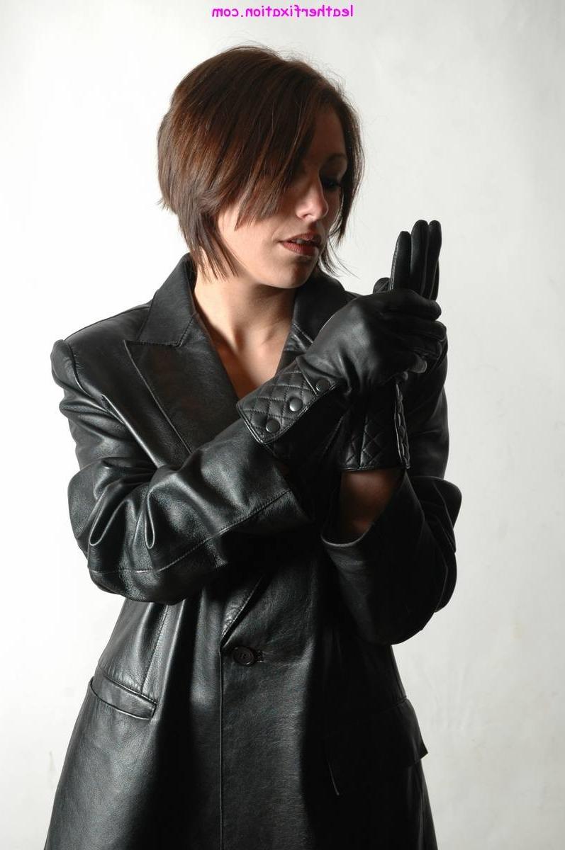 15P Gorgeous brunette in sexy black leather jacket accompanied by a pair of soft lea