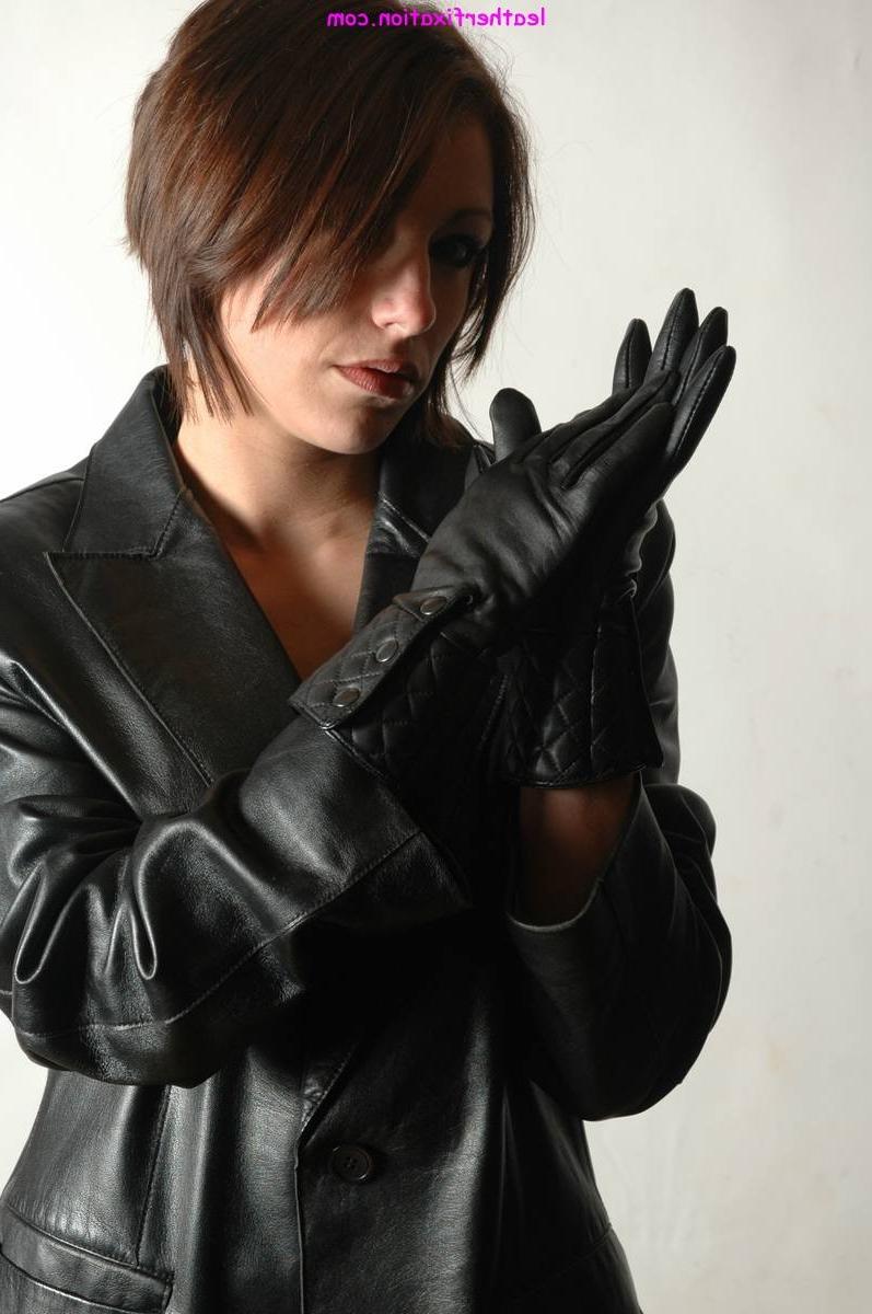 15P Gorgeous brunette in sexy black leather jacket accompanied by a pair of soft lea