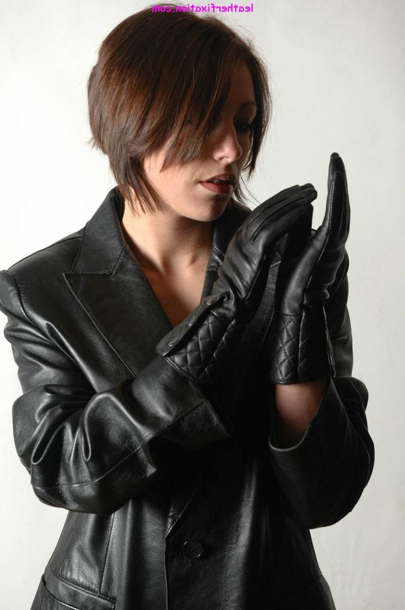 15P Gorgeous brunette in sexy black leather jacket accompanied by a pair of soft lea