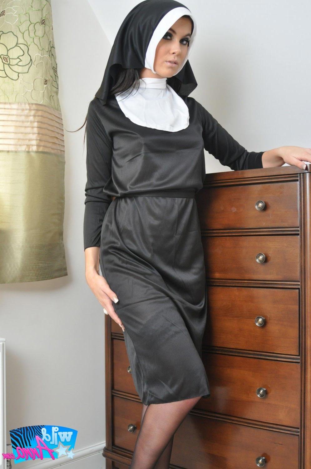 16P Brunette teen in nun uniform