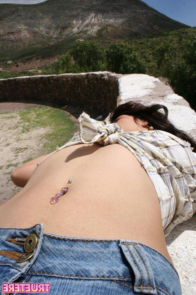 16P Teen girl in jeans outside