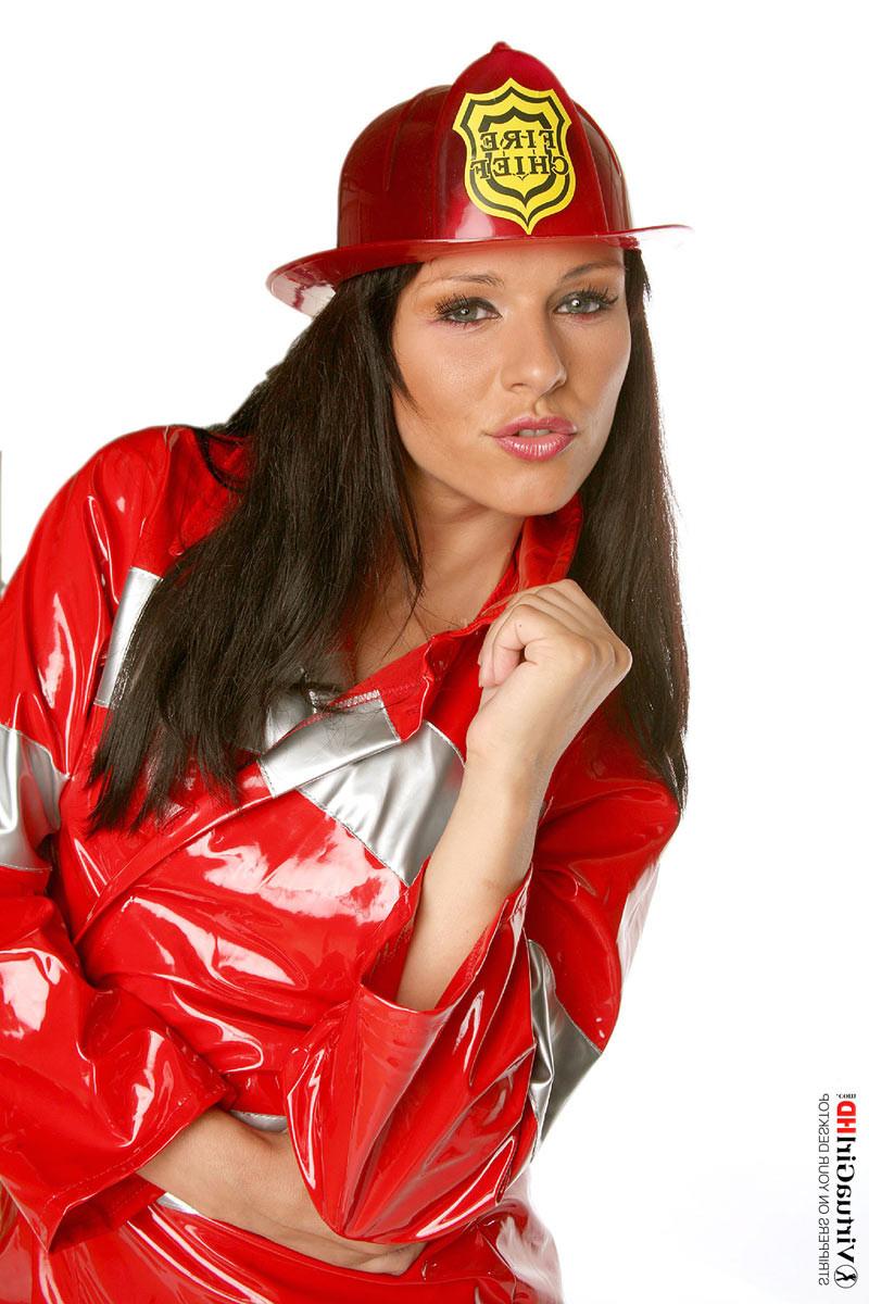 16P Naughty brunette Katty posing in a fireman uniform