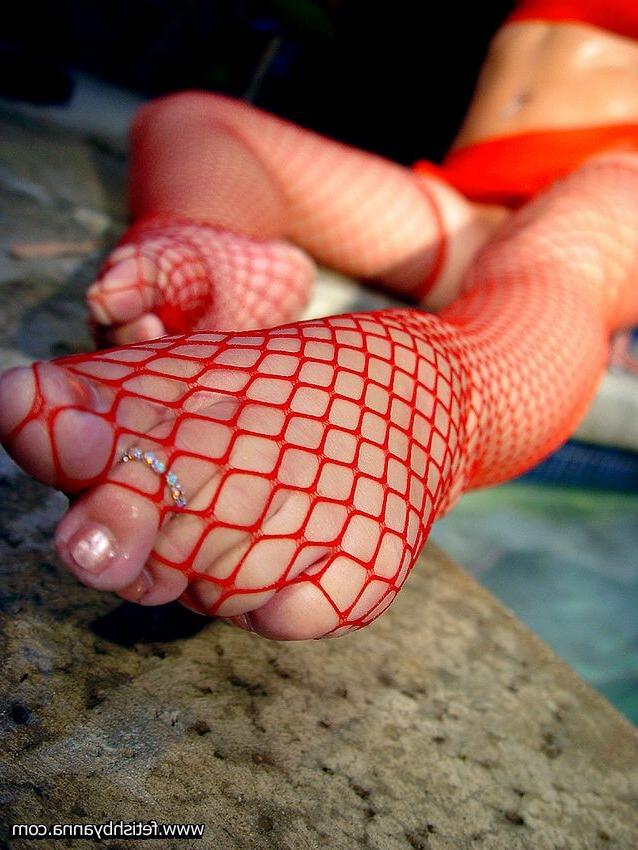 11P toes enclosed in red fishnet hose