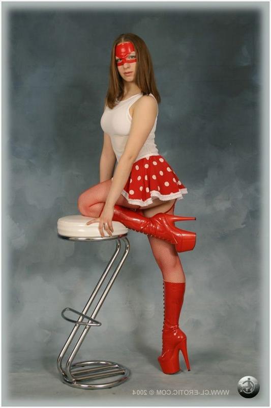 16P Contortionist poses in red fishnet stockings