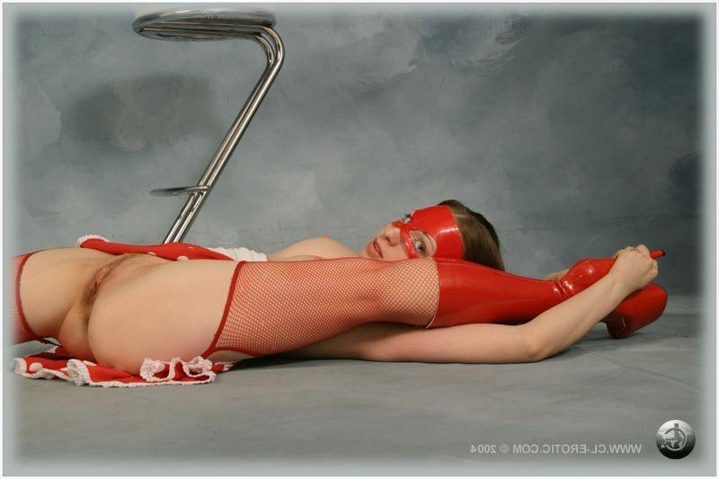 16P Contortionist poses in red fishnet stockings