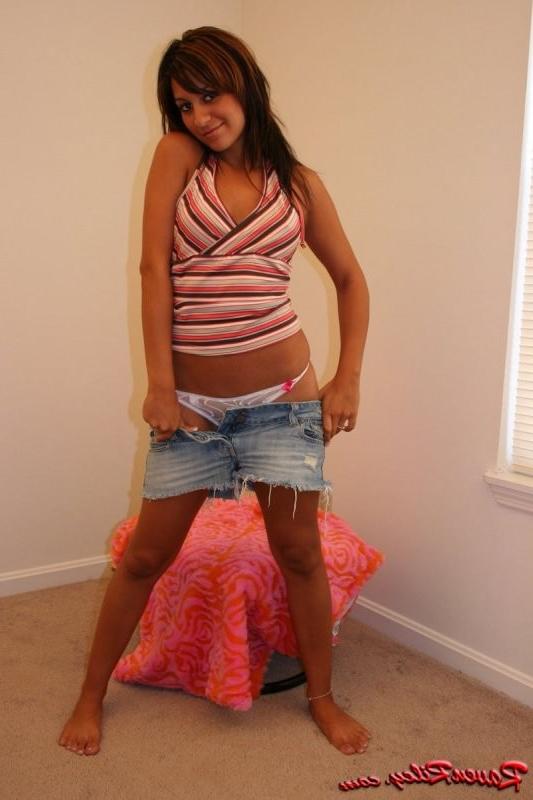 15P Tanned brunette teen strips down her lacy panties