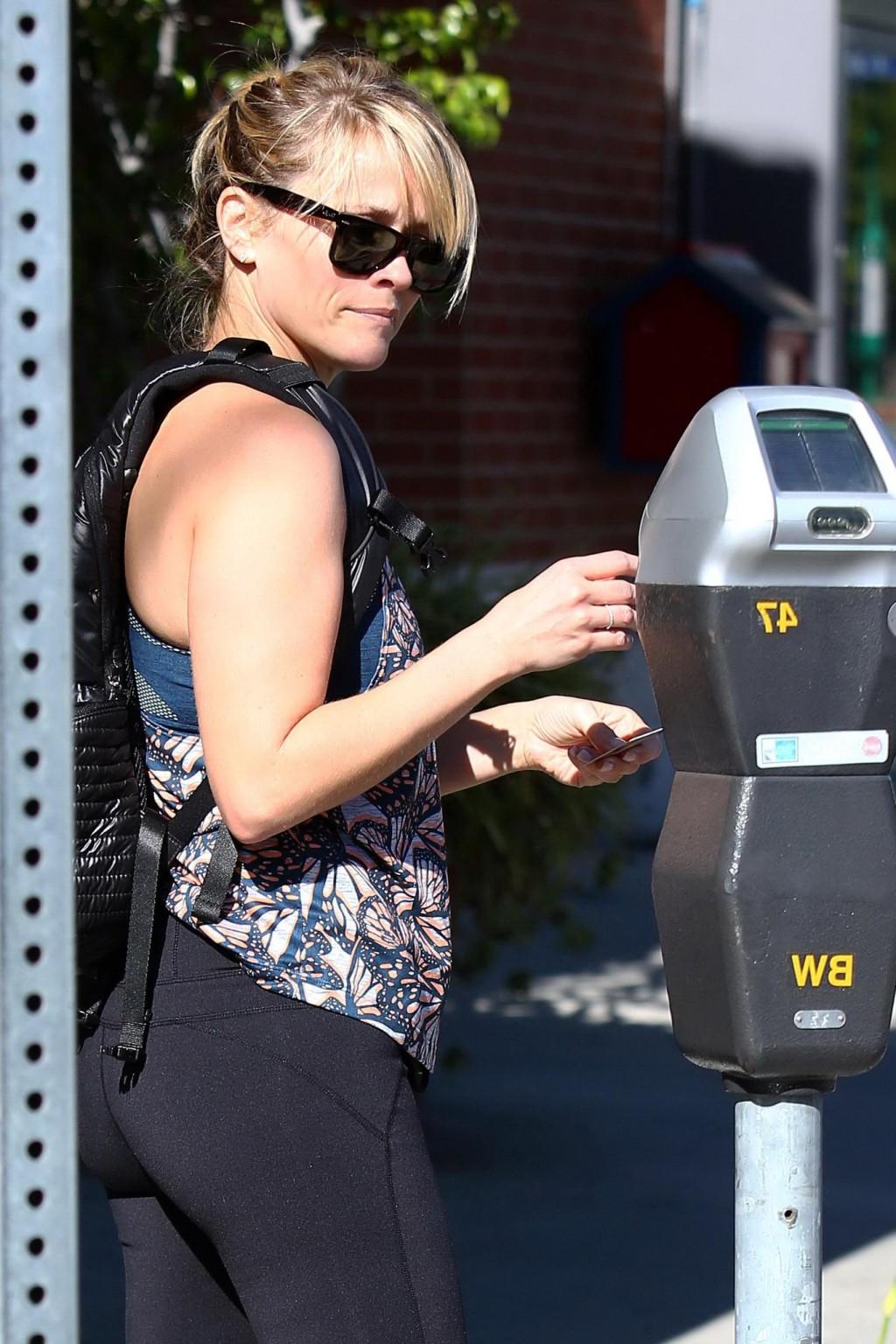 16P Reese Witherspoon shows off her ass wearing black tights outside a gym in Brentw