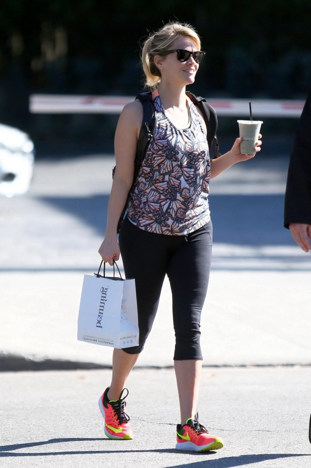 16P Reese Witherspoon shows off her ass wearing black tights outside a gym in Brentw