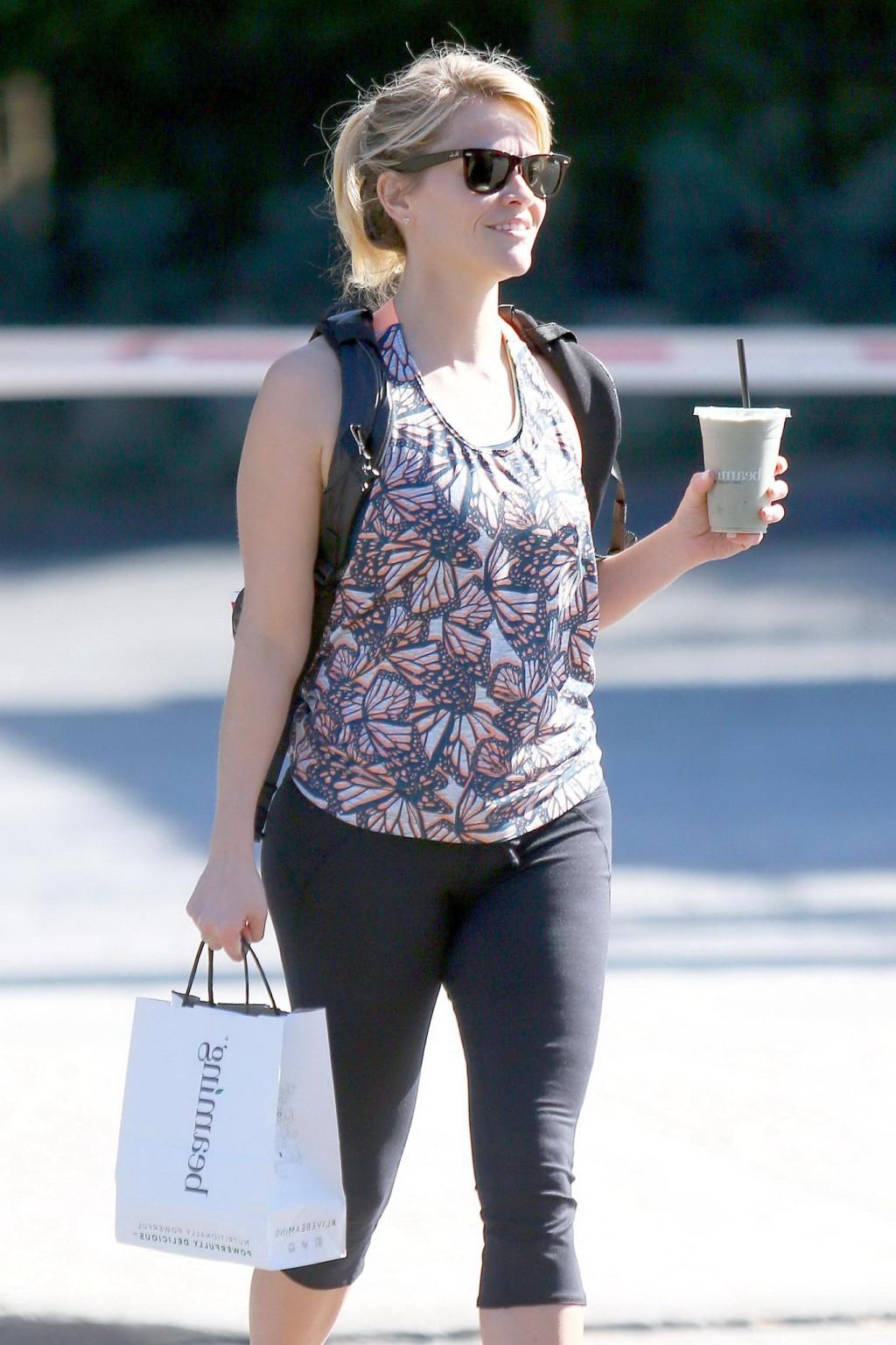 16P Reese Witherspoon shows off her ass wearing black tights outside a gym in Brentw