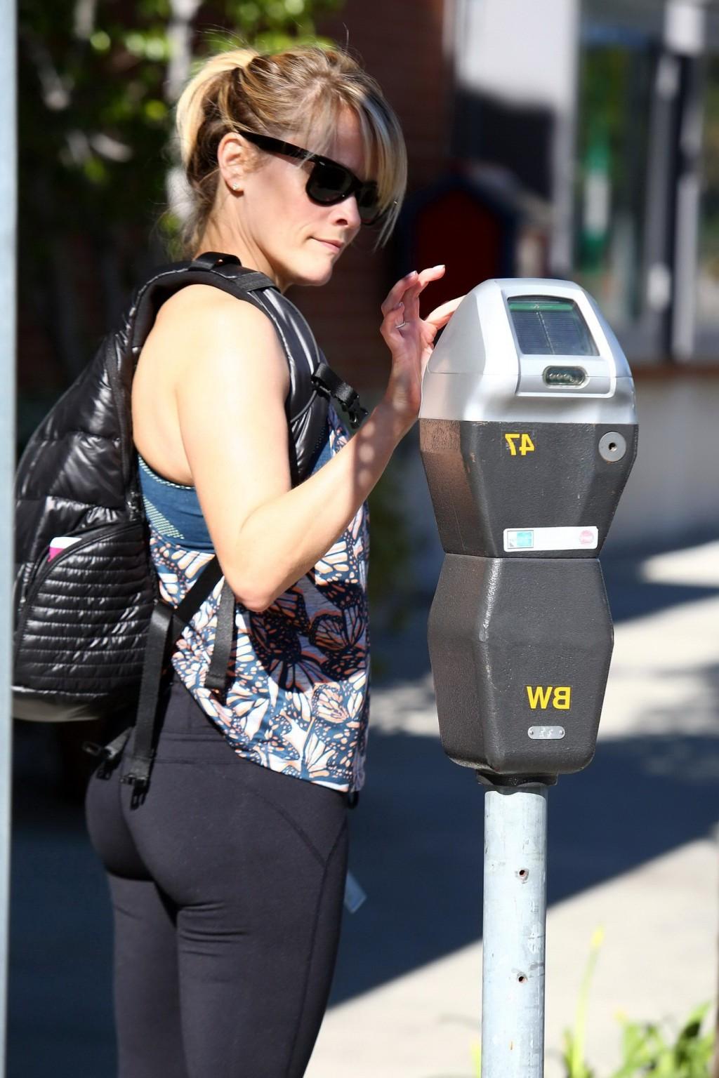 16P Reese Witherspoon shows off her ass wearing black tights outside a gym in Brentw