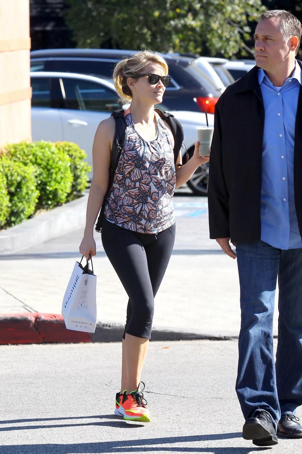 16P Reese Witherspoon shows off her ass wearing black tights outside a gym in Brentw