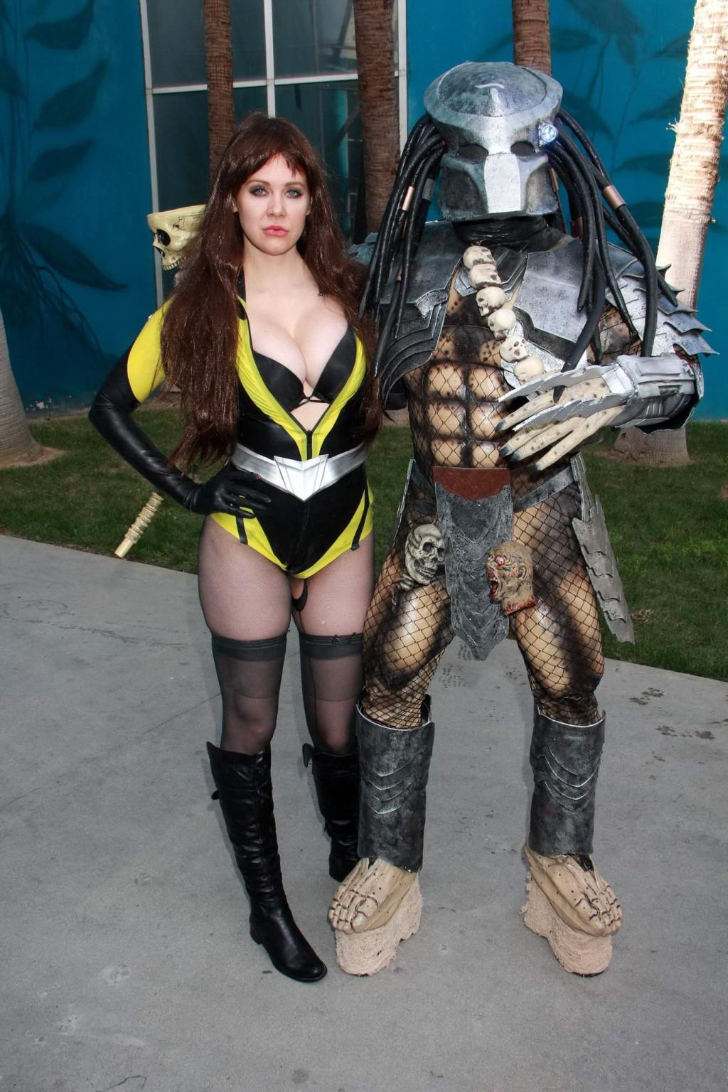 16P Busty Maitland Ward wearing latex bodysuit fishnets and boots at the Long Beach 