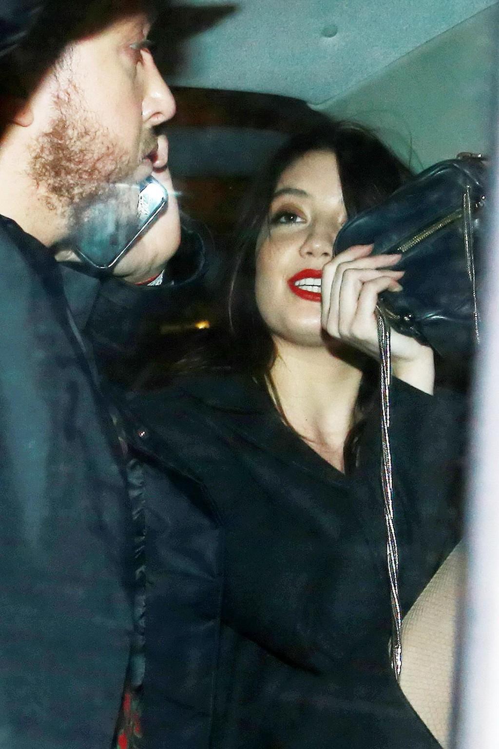 16P Busty Daisy Lowe wears red latex mini dress fishnets  fuckme boots leaving the W