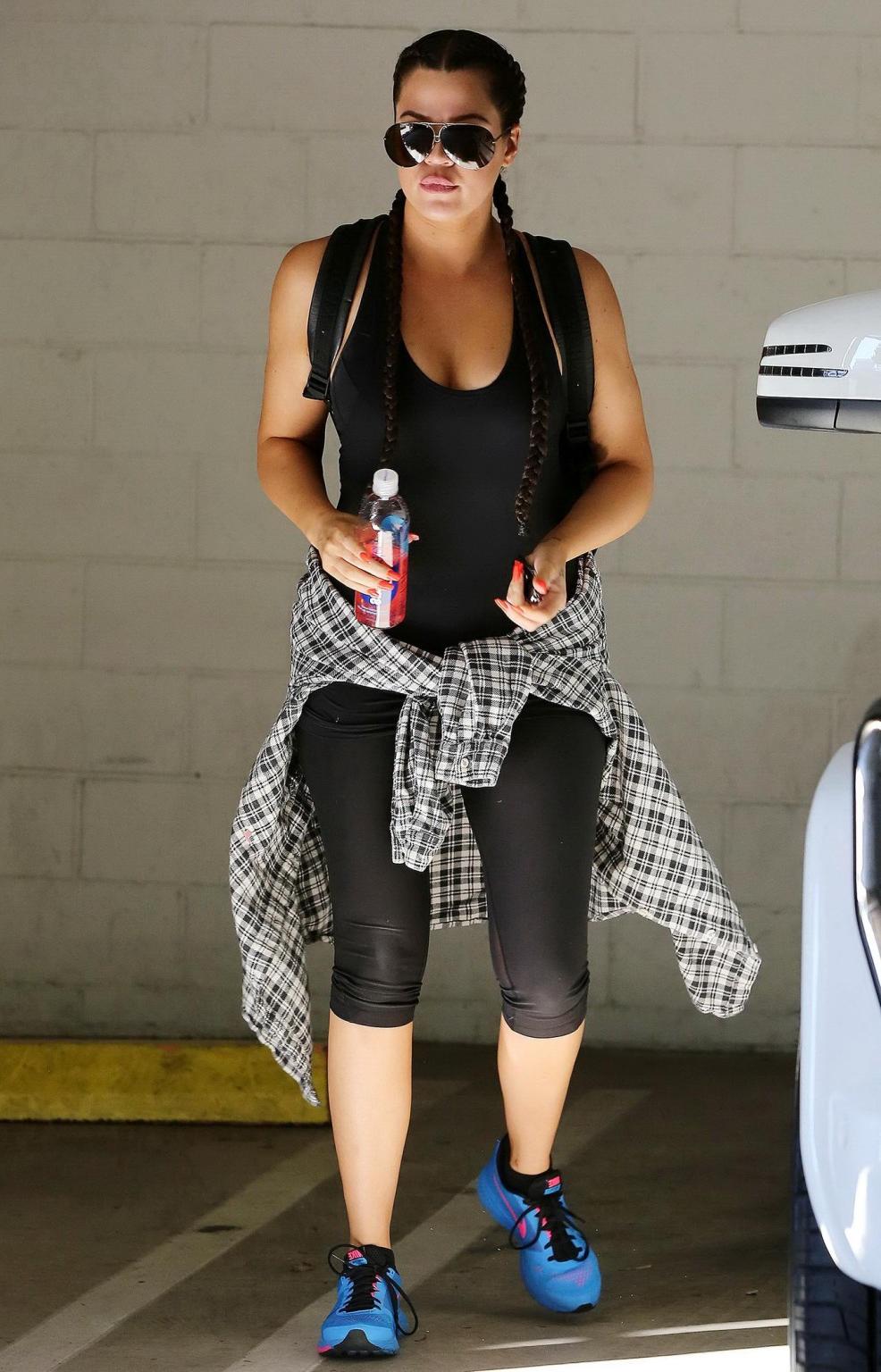 16P Khloe Kardashian busty wearing a black tanktop outside a gym in Beverly Hills