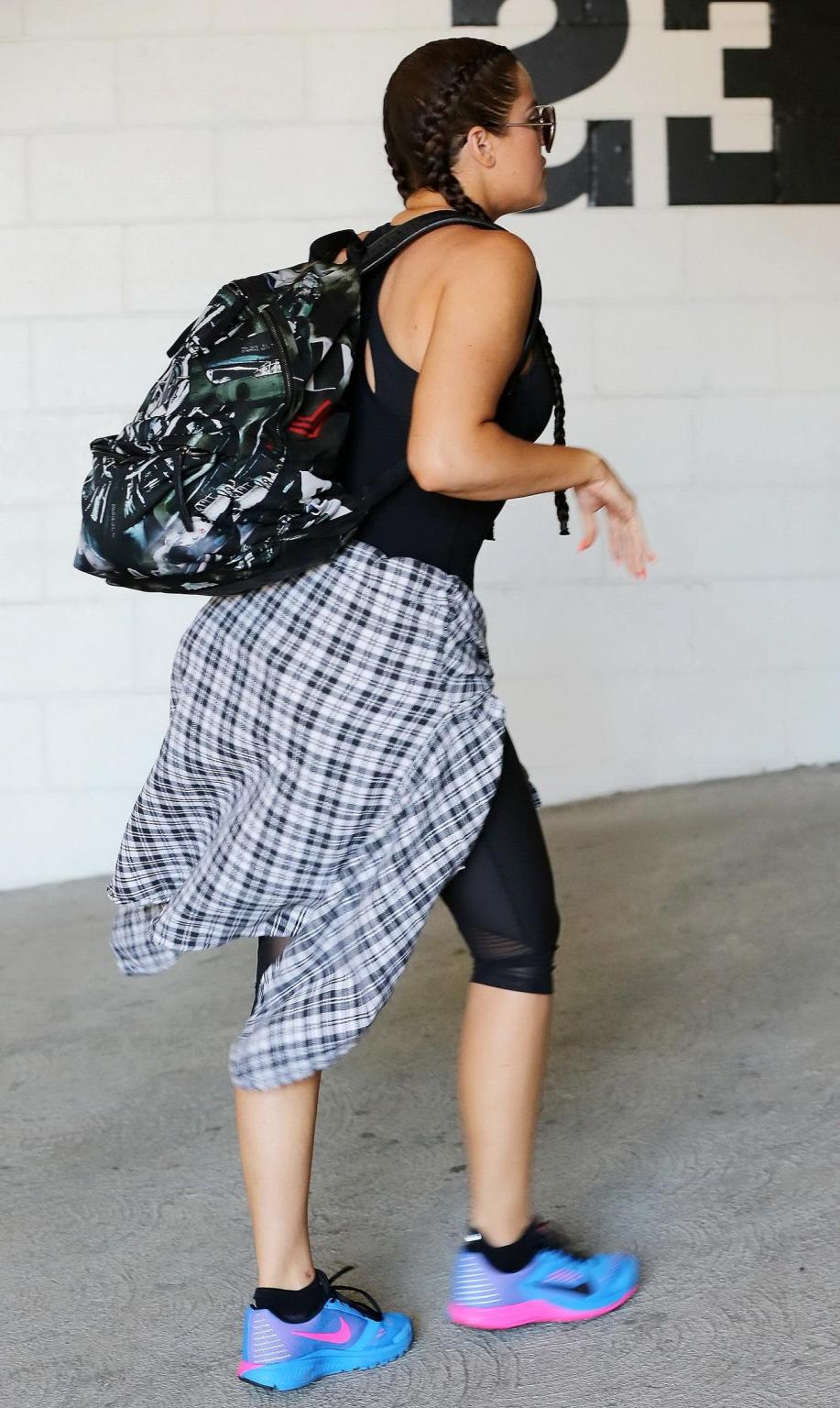 16P Khloe Kardashian busty wearing a black tanktop outside a gym in Beverly Hills