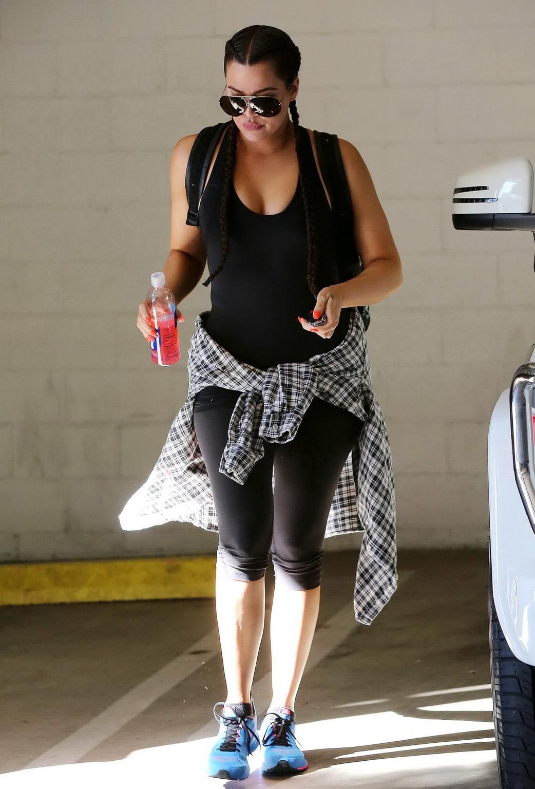 16P Khloe Kardashian busty wearing a black tanktop outside a gym in Beverly Hills