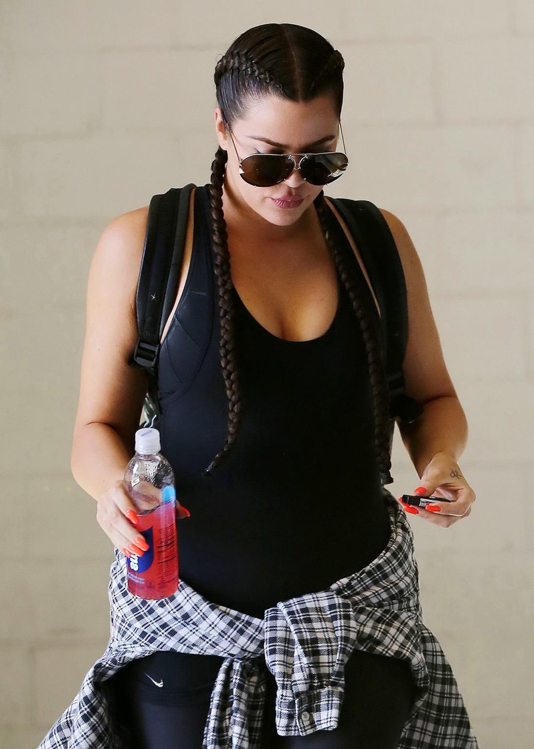 16P Khloe Kardashian busty wearing a black tanktop outside a gym in Beverly Hills