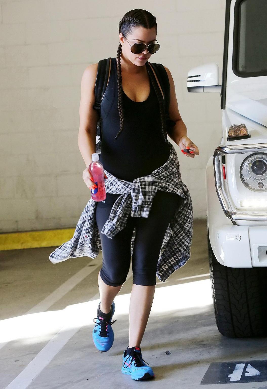 16P Khloe Kardashian busty wearing a black tanktop outside a gym in Beverly Hills