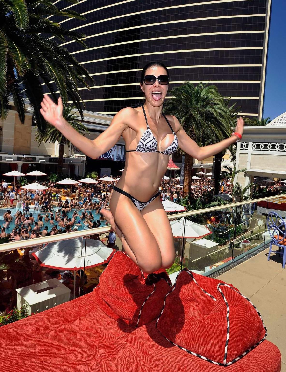 10P Adrianne Curry showing off her bikini body at Encore Beach Club in Las Vegas