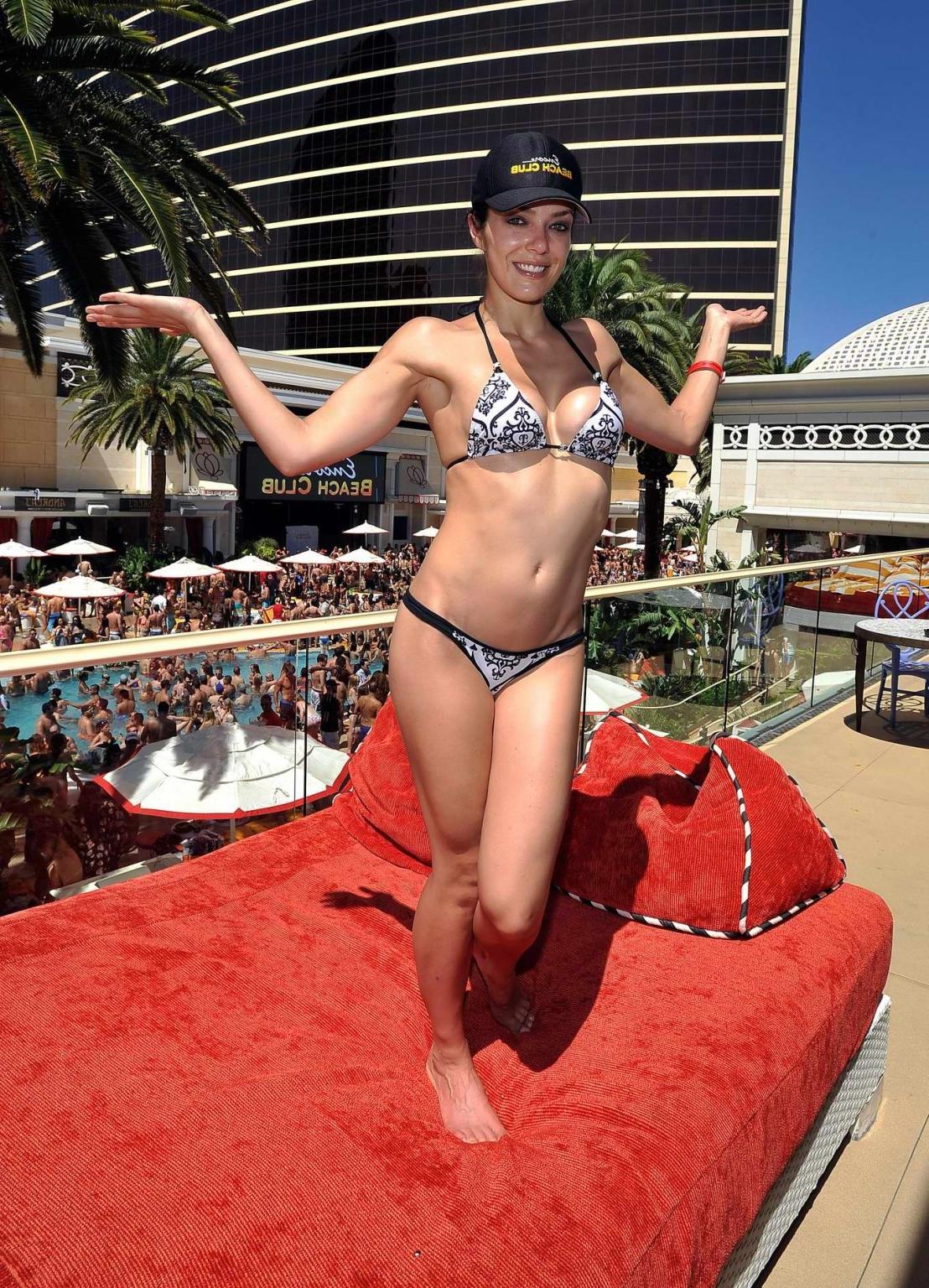 10P Adrianne Curry showing off her bikini body at Encore Beach Club in Las Vegas