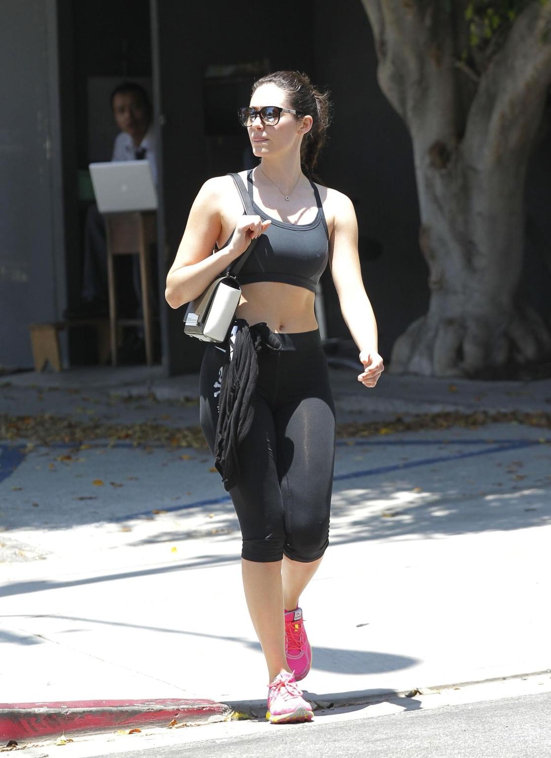 16P Emmy Rossum shows pokies in a black sports bra leaving a gym in Beverly Hills