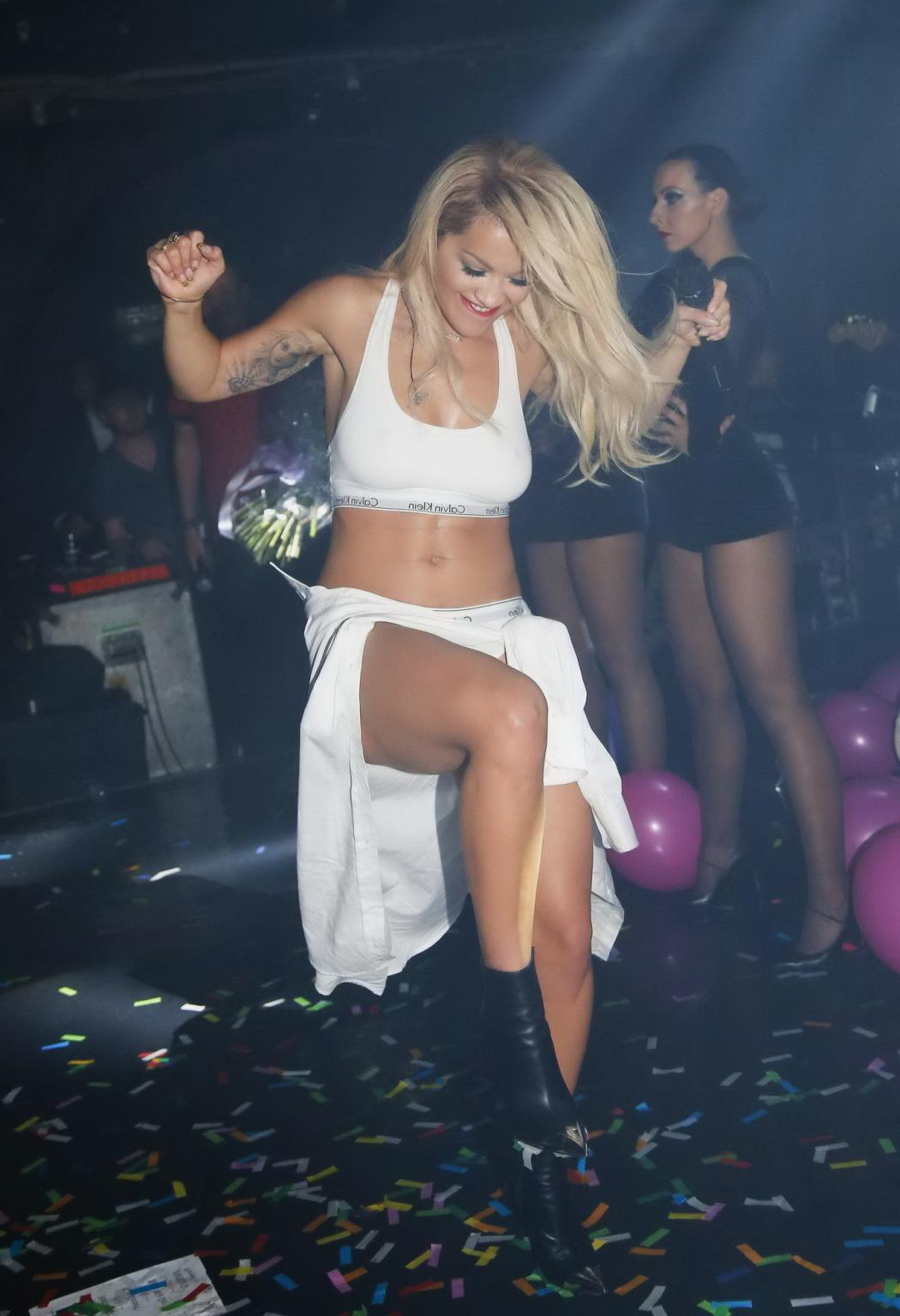 16P Rita Ora showing pokies in white seethru lingerie while performs at the GAY Club