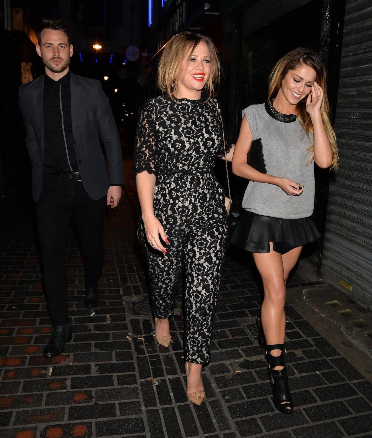 16P Cheryl Cole leggy wearing a leather mini dress outside the Box Club in London