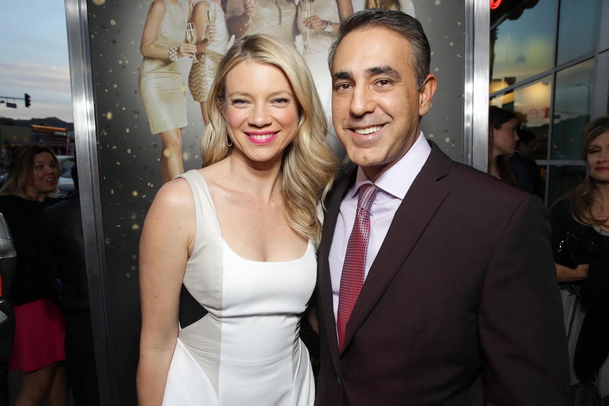 16P Amy Smart cleavy and leggy in a white mini dress at The Single Moms Club premier