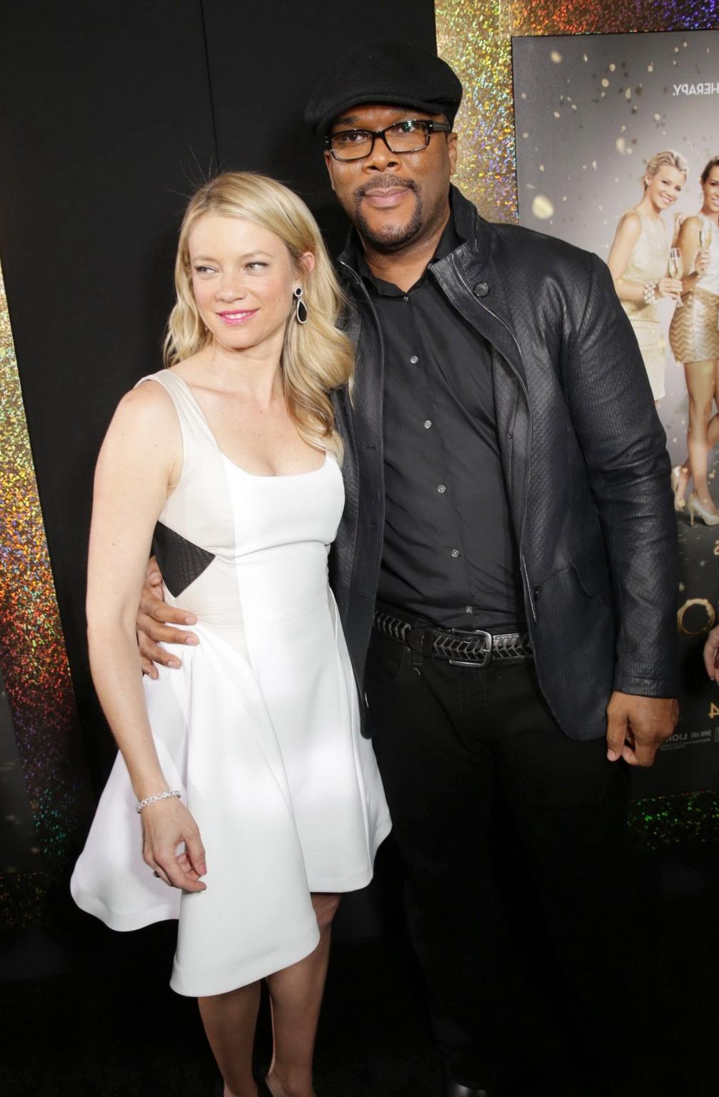 16P Amy Smart cleavy and leggy in a white mini dress at The Single Moms Club premier