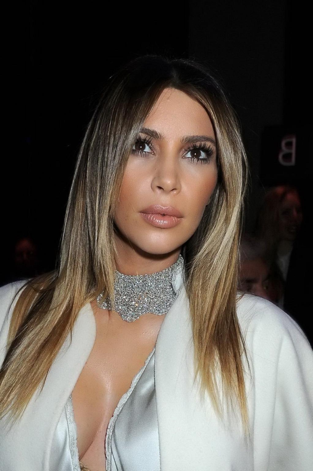 16P Kim Kardashian cleavy wearing low cut white satin gown at Stephane Rolland's fas