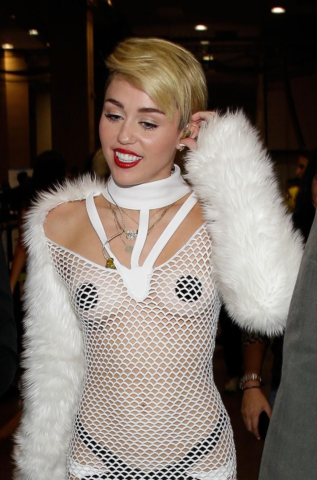 16P Miley Cyrus wearing pasties  fishnet at the  iHeartRadio Music Festival in Las V