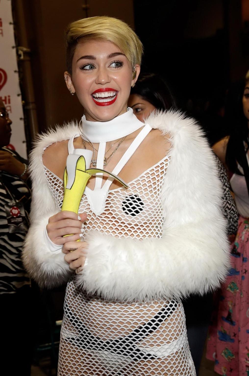 16P Miley Cyrus wearing pasties  fishnet at the  iHeartRadio Music Festival in Las V