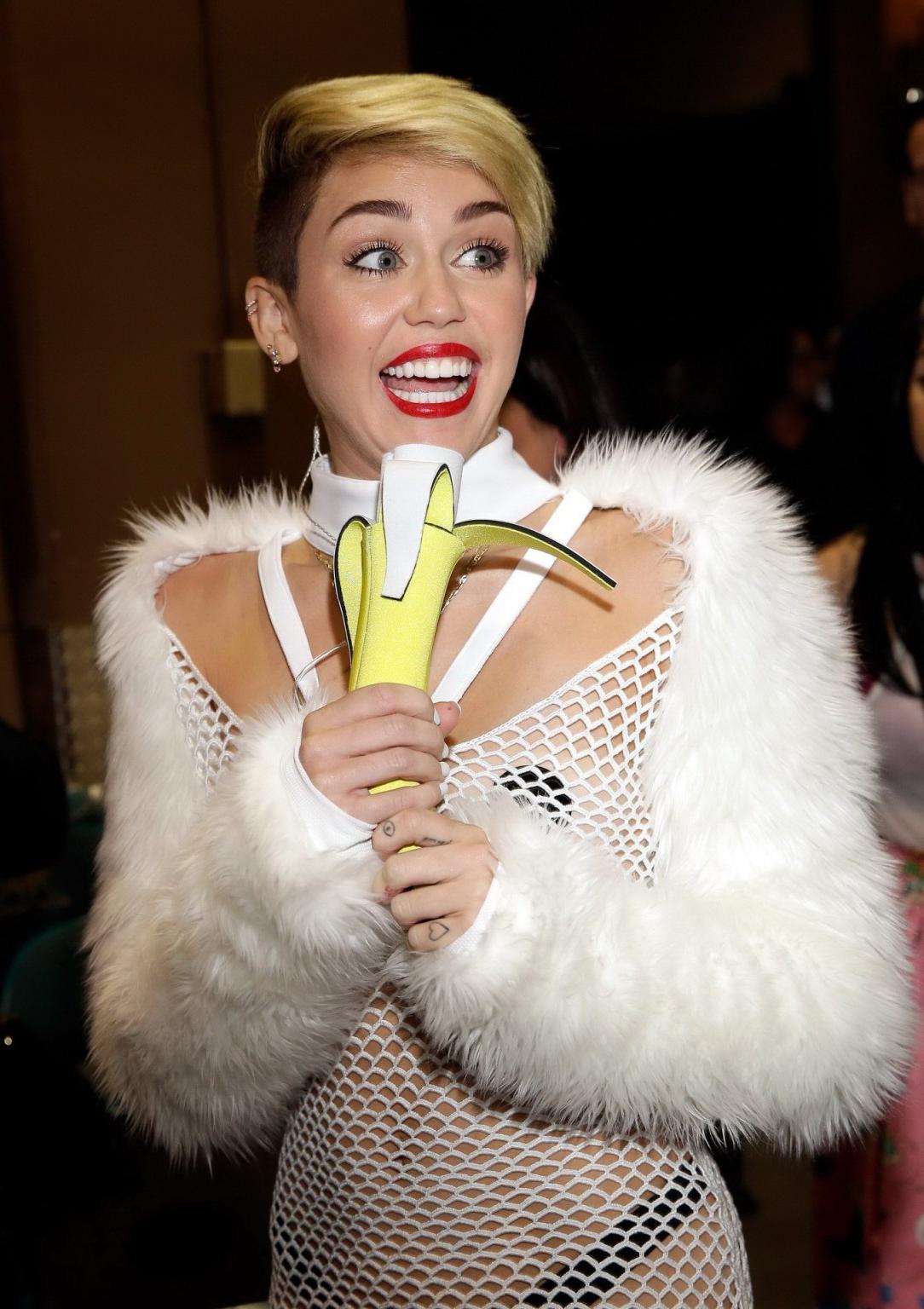 16P Miley Cyrus wearing pasties  fishnet at the  iHeartRadio Music Festival in Las V